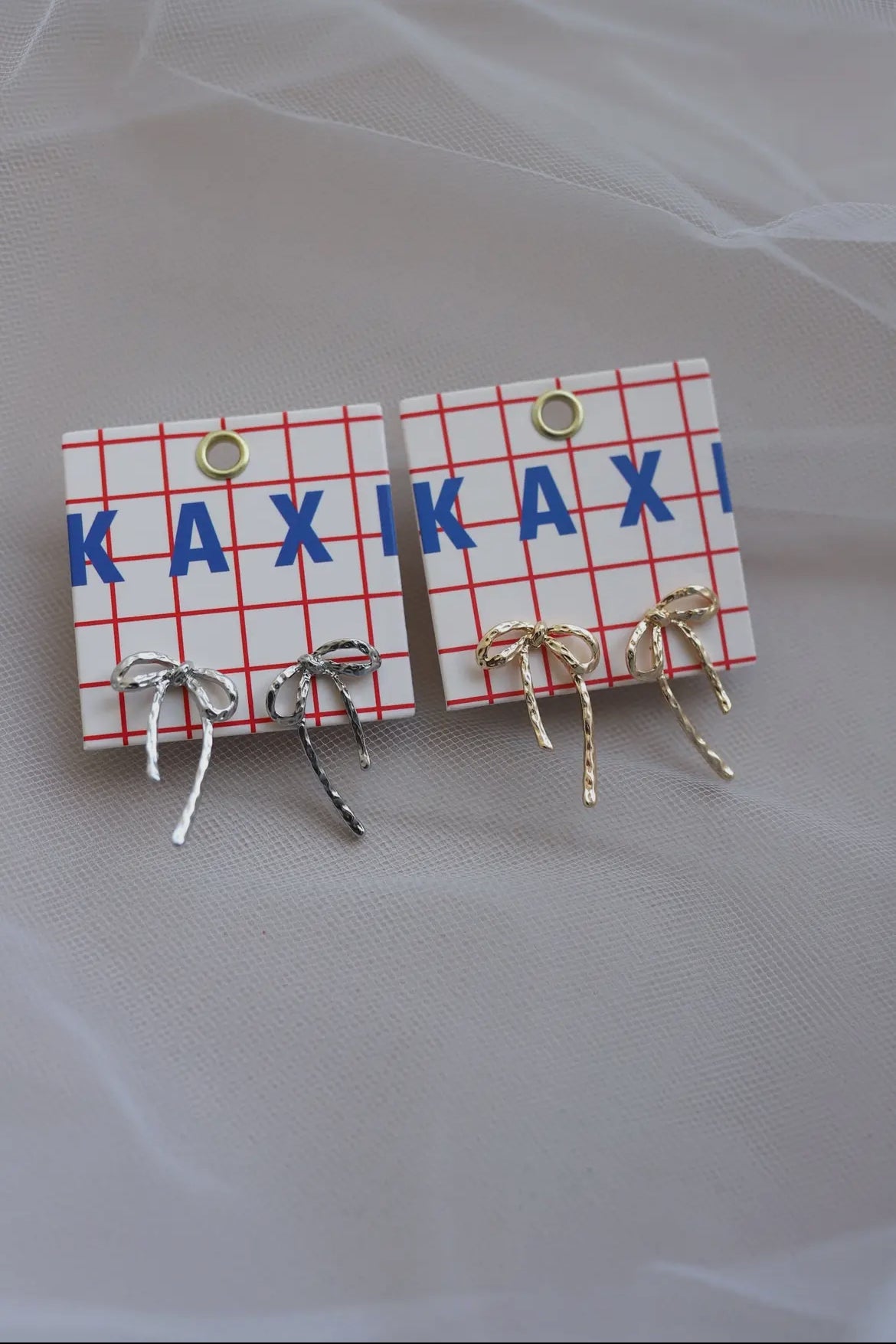 kaxi mini bow earrings