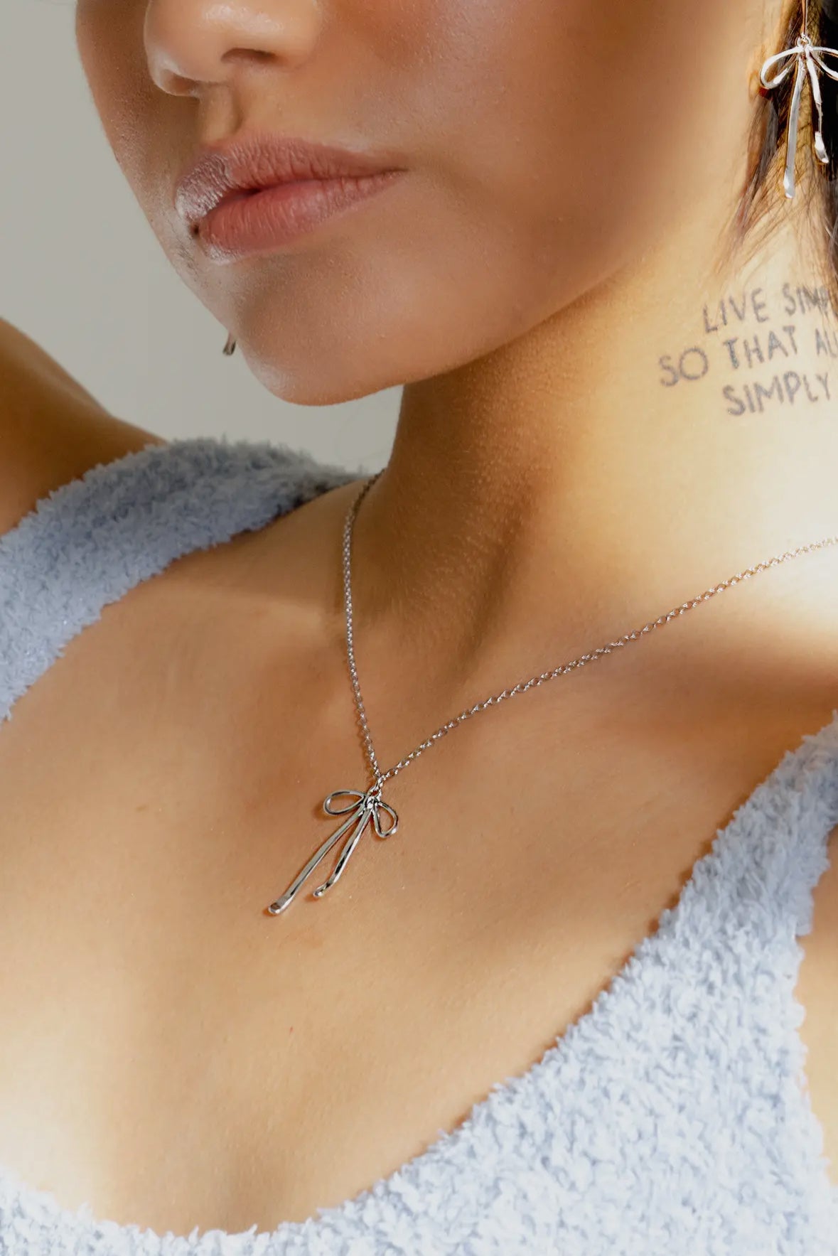 bad to the bow necklace