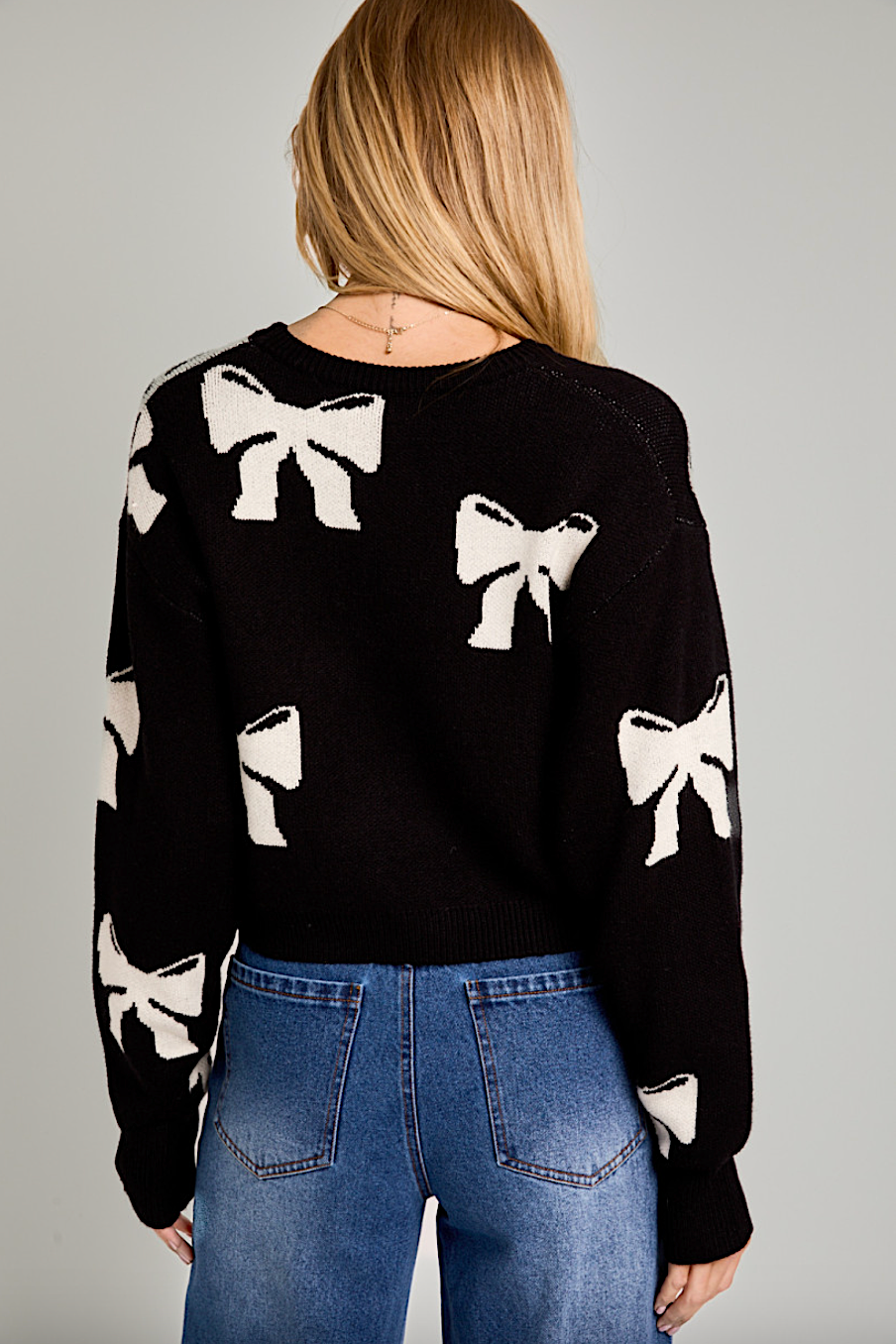 cropped coquette bow sweater